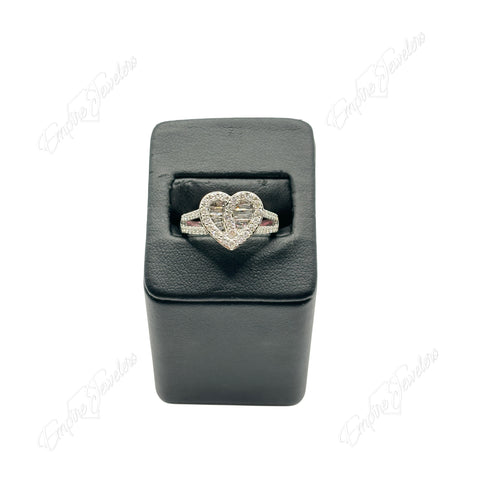 A heart-shaped 10KT white gold ring with diamonds displayed on a black square mount.